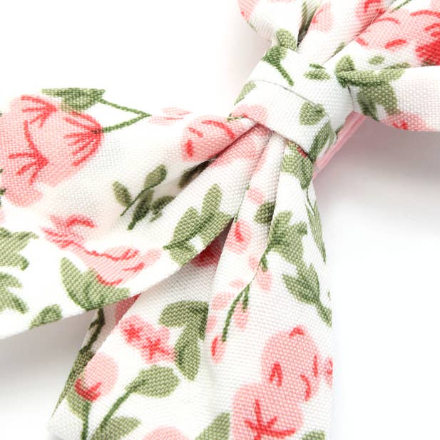 Card of 2 floral print white bow clips 5cm